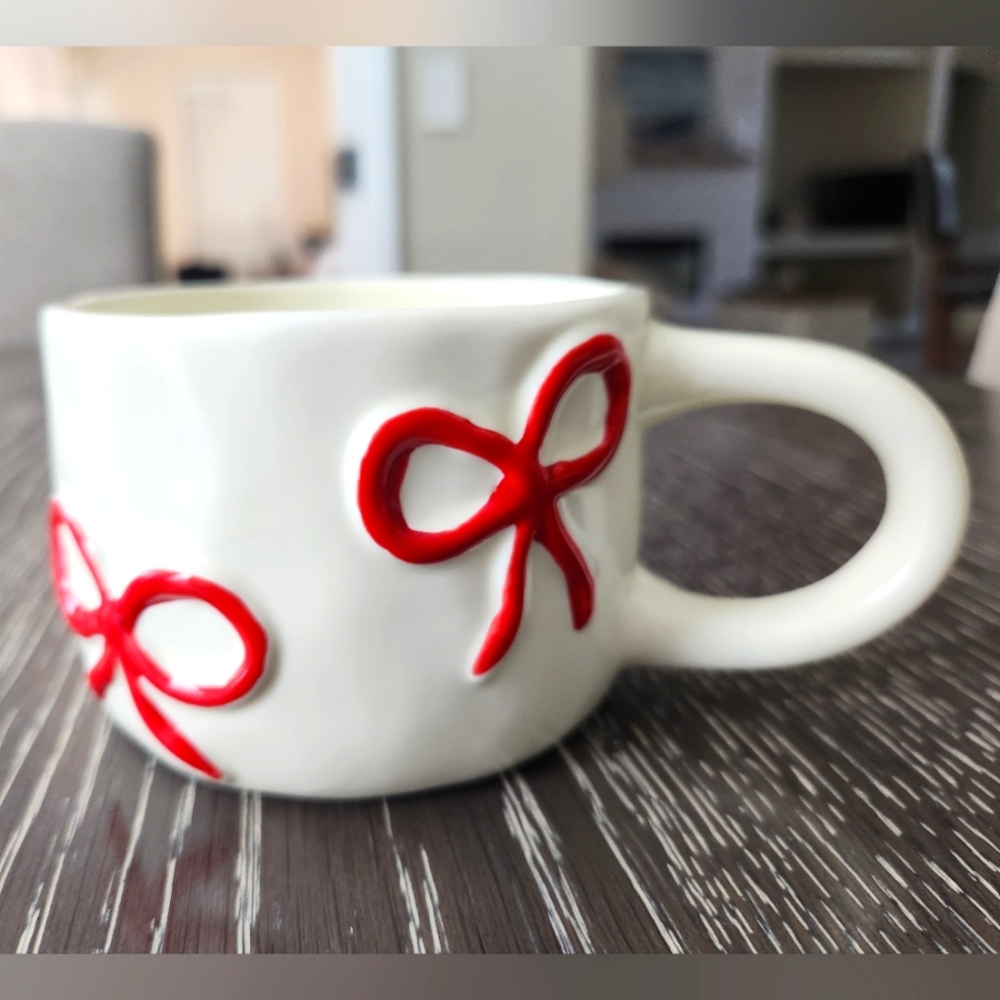 New NEVER USED Red Bow Ceramic Mug. 4 Bows, Two On Each Side.